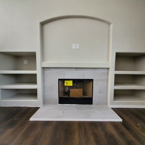Wood Burning Fireplace With Tv Niche And Entertainment Shelves